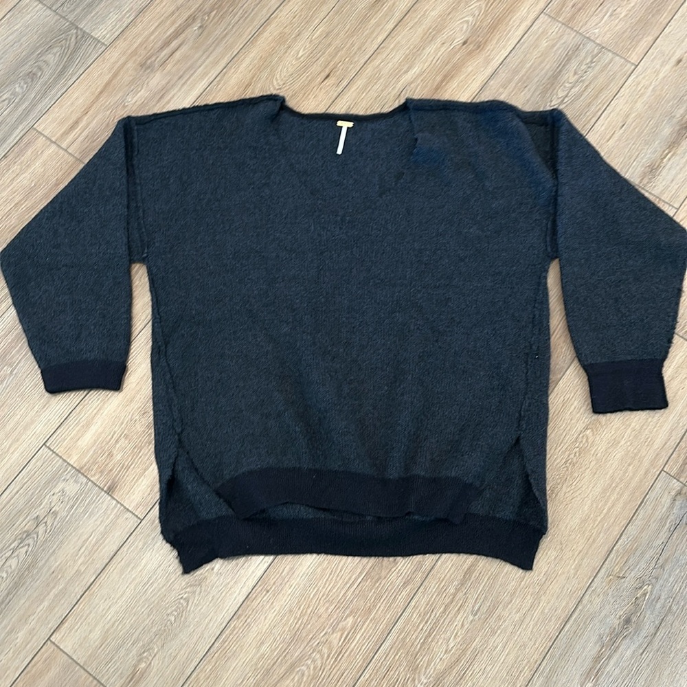 Free people sweater size med but looks large